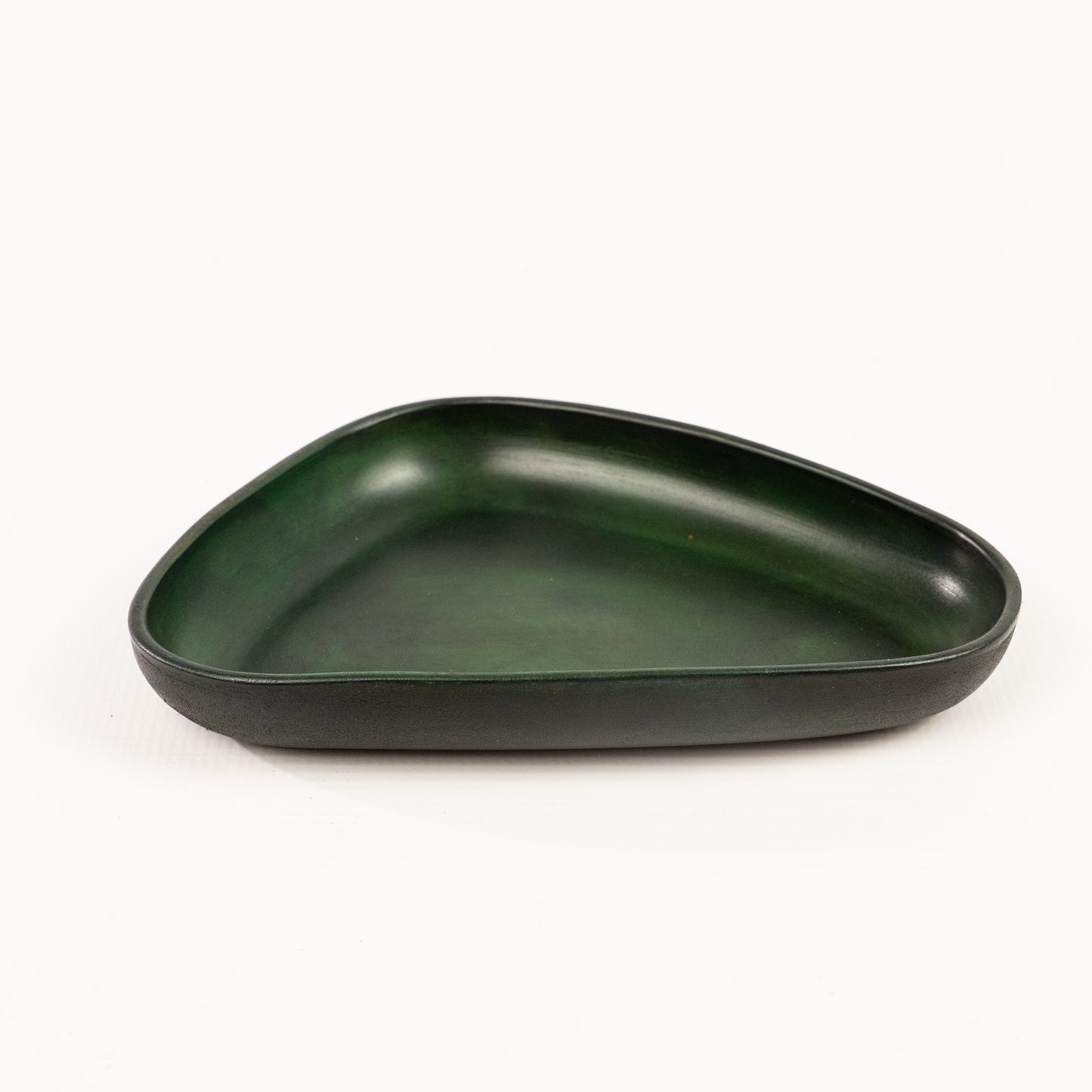 Green Hand Dyed 3D molded leather valet tray transforms any space into a sanctuary of sophisticated organization. Crafted using advanced 3D molding technology, every curve and compartment is perfectly contoured to keep your essentials in perfect order. Handcrafted by Atom Leather.