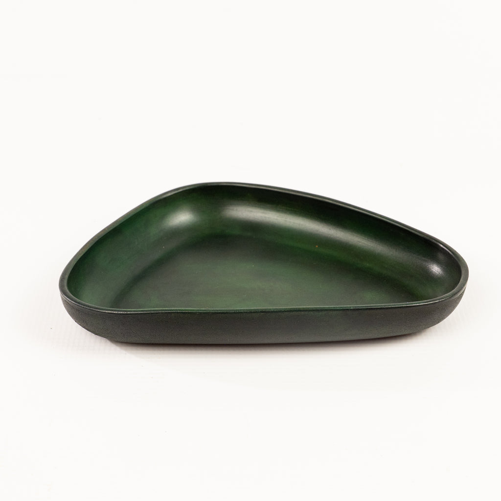 Green Hand Dyed 3D molded leather valet tray transforms any space into a sanctuary of sophisticated organization. Crafted using advanced 3D molding technology, every curve and compartment is perfectly contoured to keep your essentials in perfect order. Handcrafted by Atom Leather.