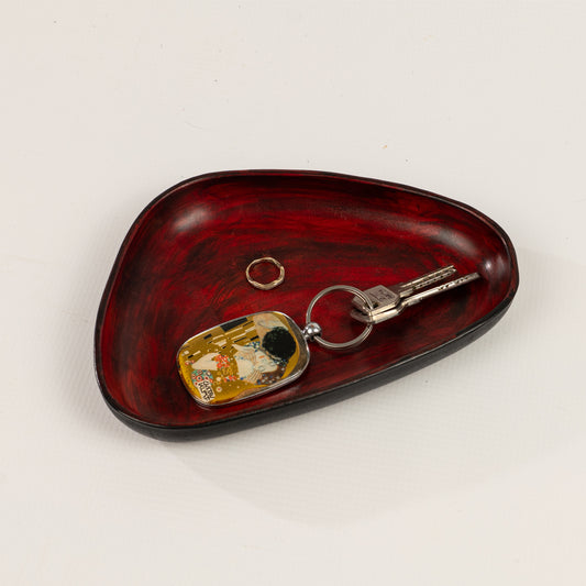 Red Hand Dyed 3D molded leather valet tray transforms any space into a sanctuary of sophisticated organization. Crafted using advanced 3D molding technology, every curve and compartment is perfectly contoured to keep your essentials in perfect order. Handcrafted by Atom Leather.