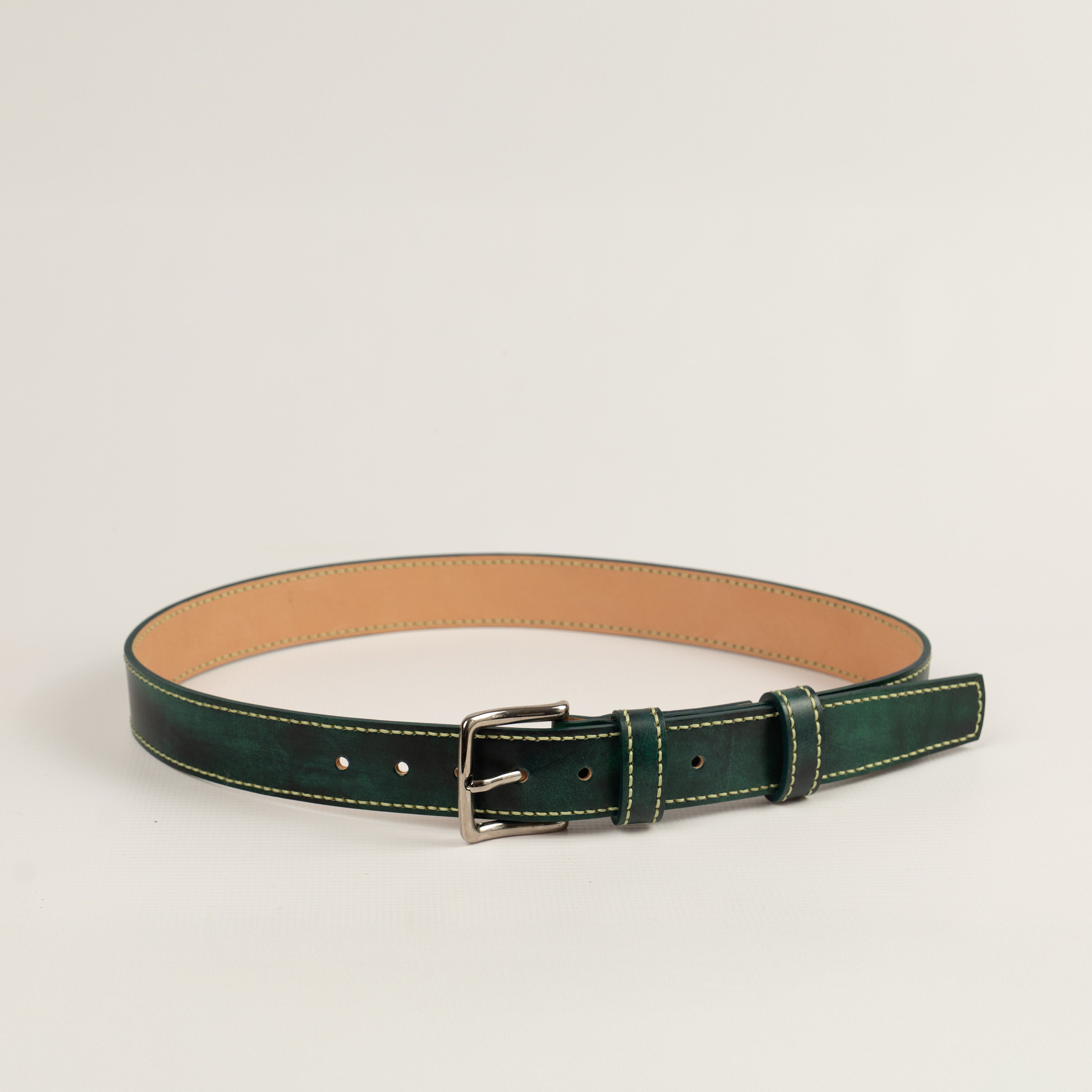 Sustainably handcrafted green leather belt from rescued leather overstocks, entirely handstitched with stainless steel hardware.
Handcrafted in Romania by ATOM LEATHER . 