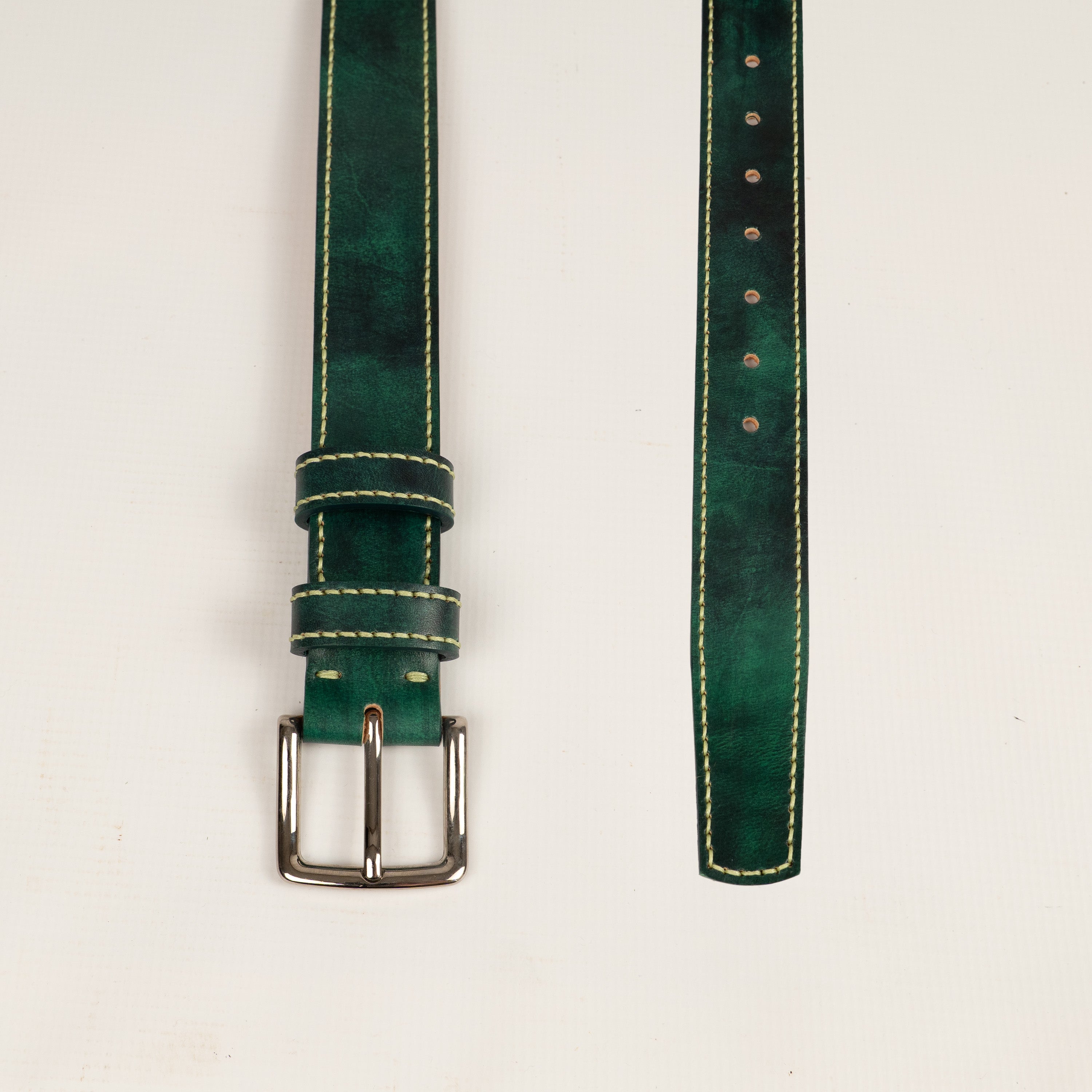 Sustainably handcrafted green leather belt from rescued leather overstocks, entirely handstitched with stainless steel hardware.
Handcrafted in Romania by ATOM LEATHER . 