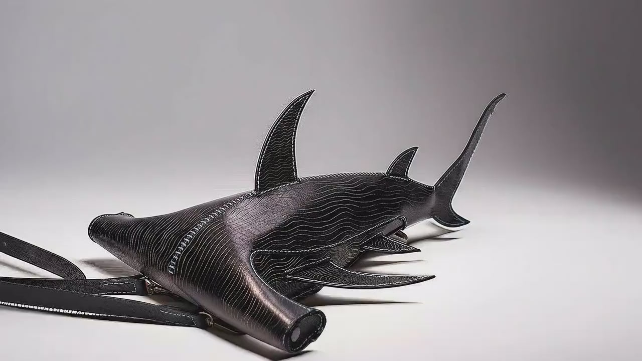 A  Hammerhead Shark Leather Bag animation on the bottom of the ocean. Made by ATOM Leather.